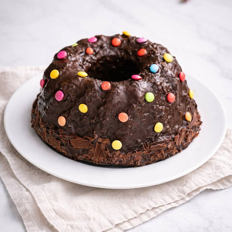 Cafe Reinhardt Gugelhupf mit Schokoglasur und Smarties 